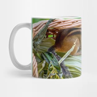 Chipmunk hides in a basket of corn Mug